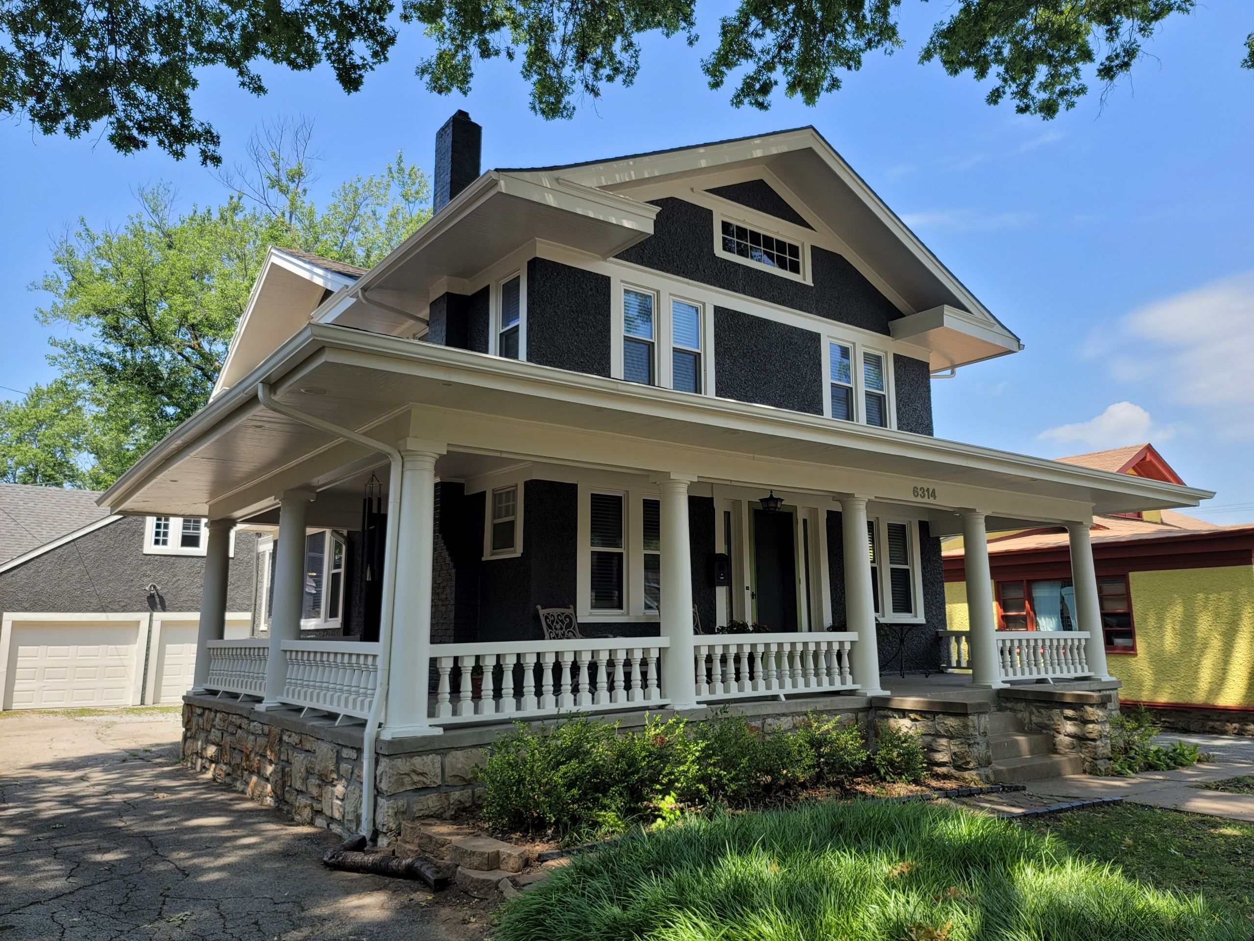 Fence and trim painting project in Lenexa, KS